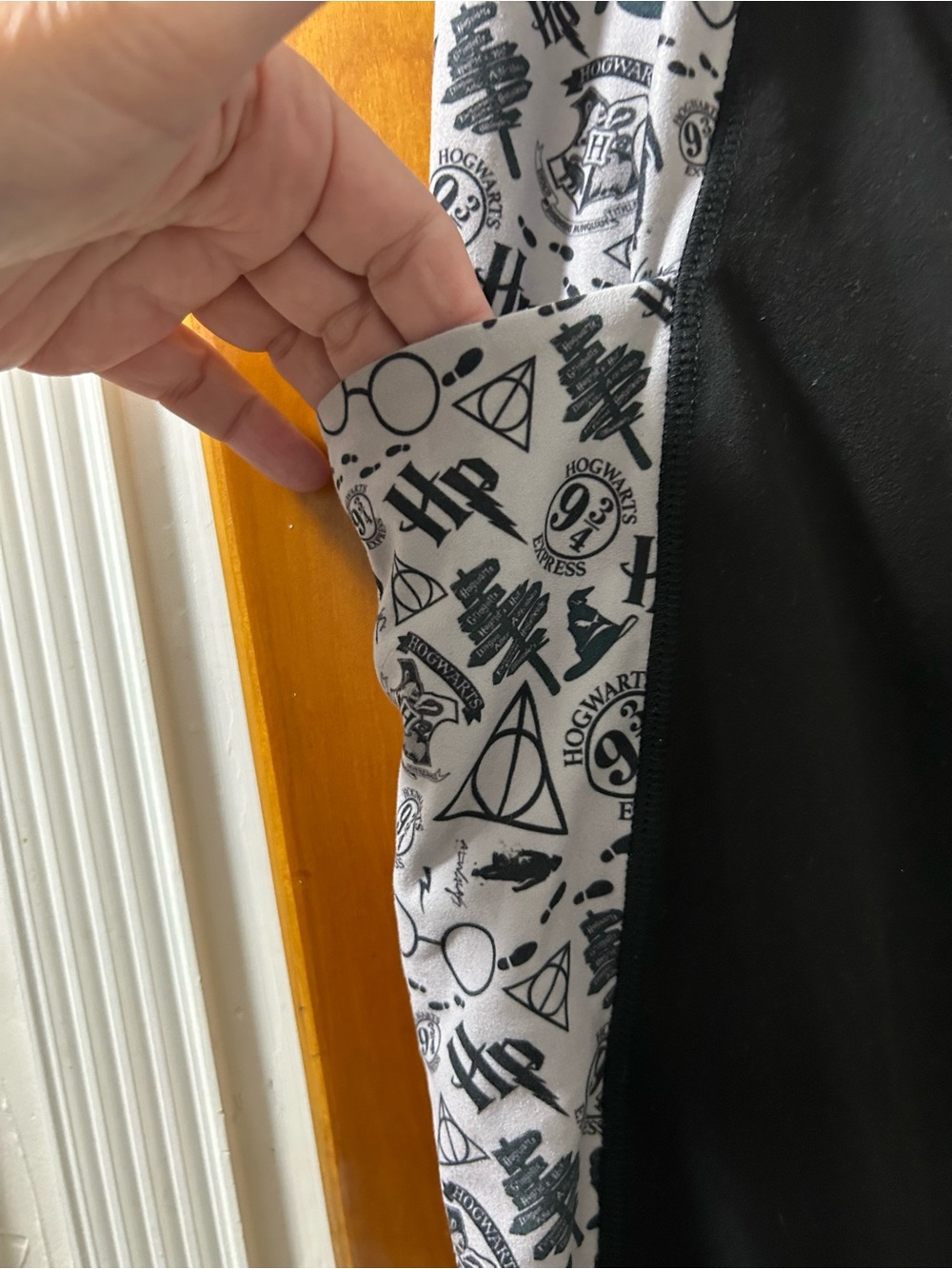 Black High-Rise Leggings with White Harry Potter themed Graphic Side Panels - Picture 4 of 6